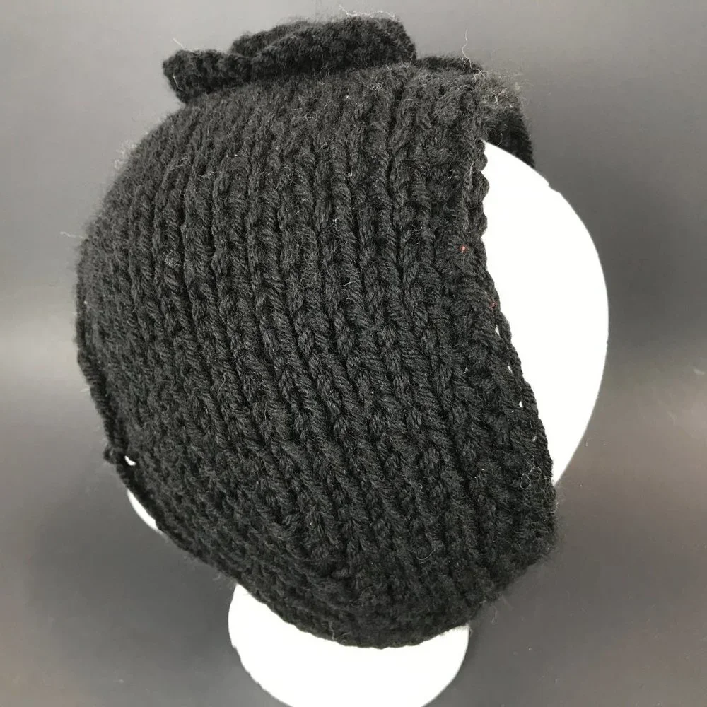 Wool blend black hand knit headband with flower accent